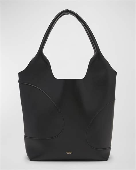 ferragamo cut out leather tote.